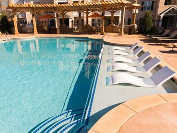Resort-style saltwater pool with tanning ledge